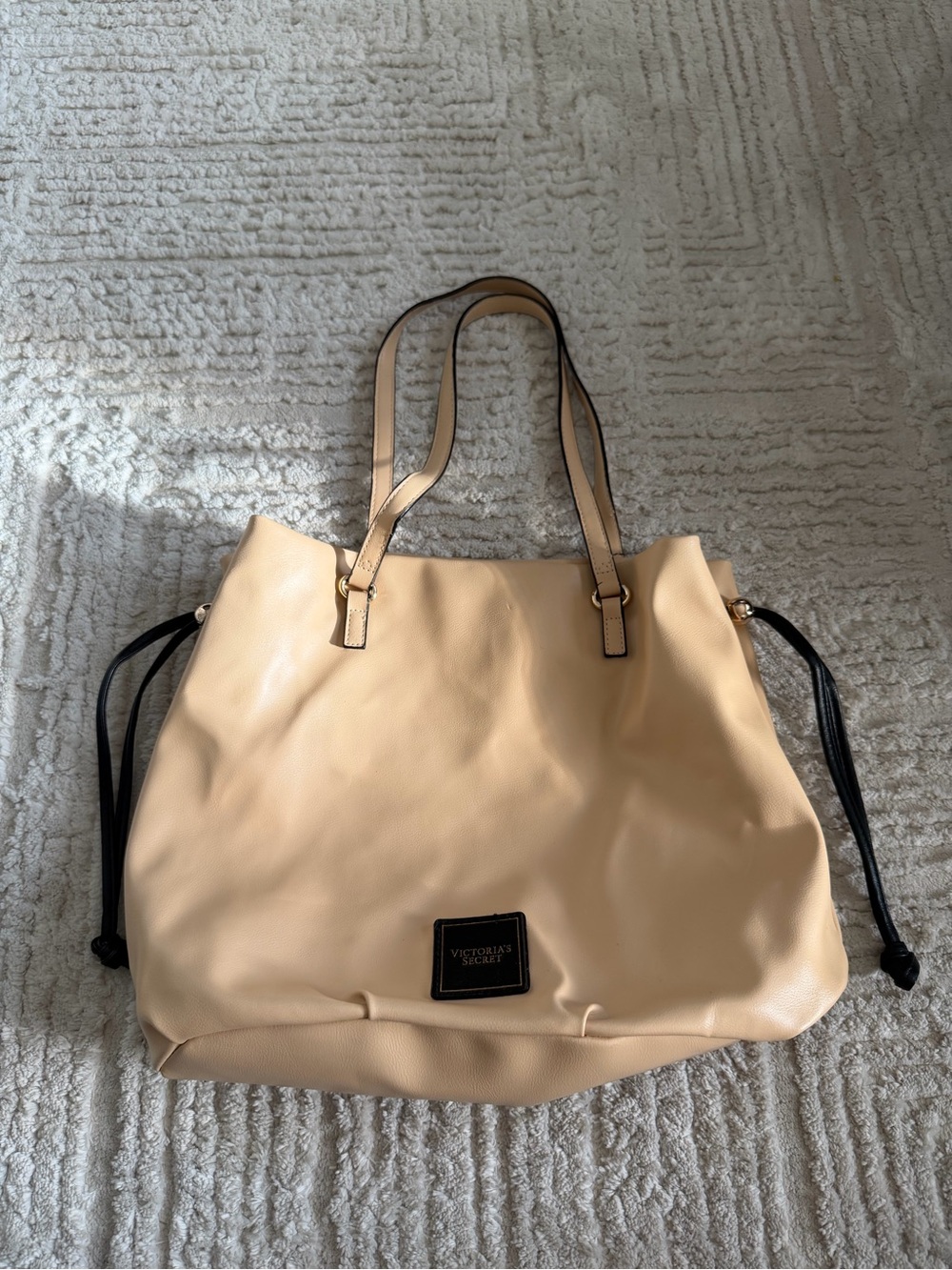 Victoria's Secret beige cinch-top tote bag